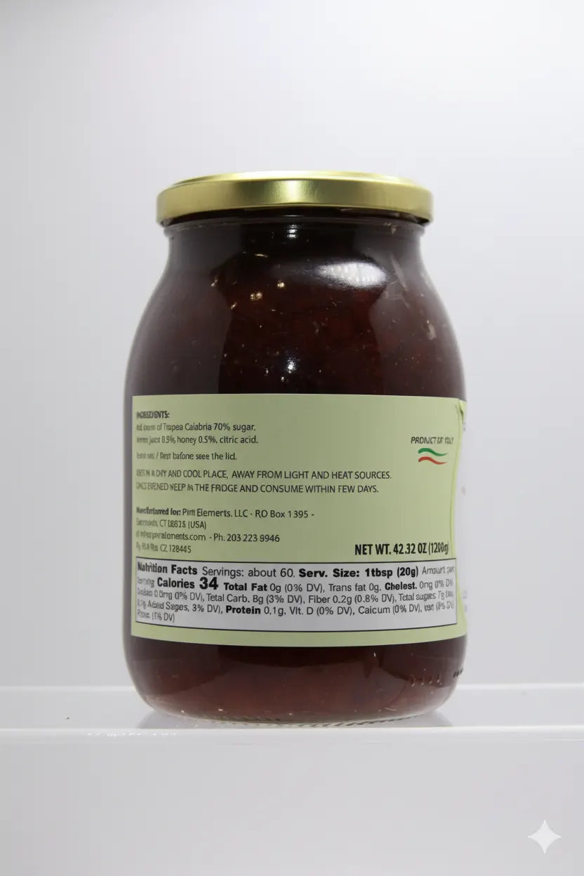 Jar of pasta sauce with a gold lid on a white background